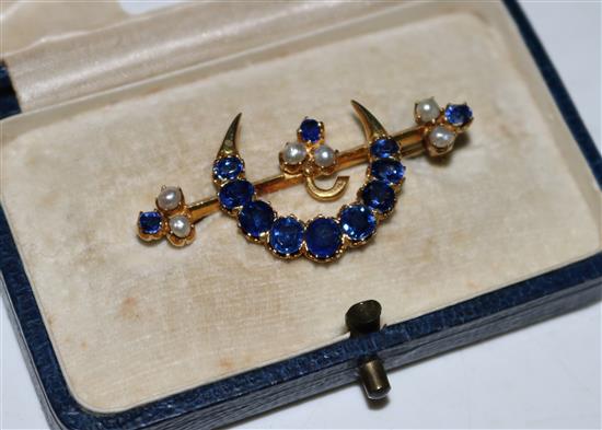 Edwardian sapphire and pearl crescent bar brooch